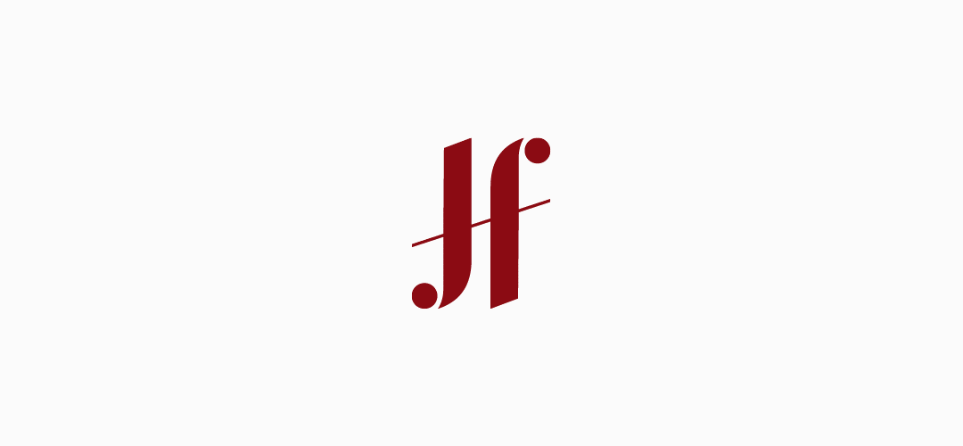 Het logo van HJF in de rode huisstijl kleur. Het logo draait en laat daarmee zien dat het een ambigram is