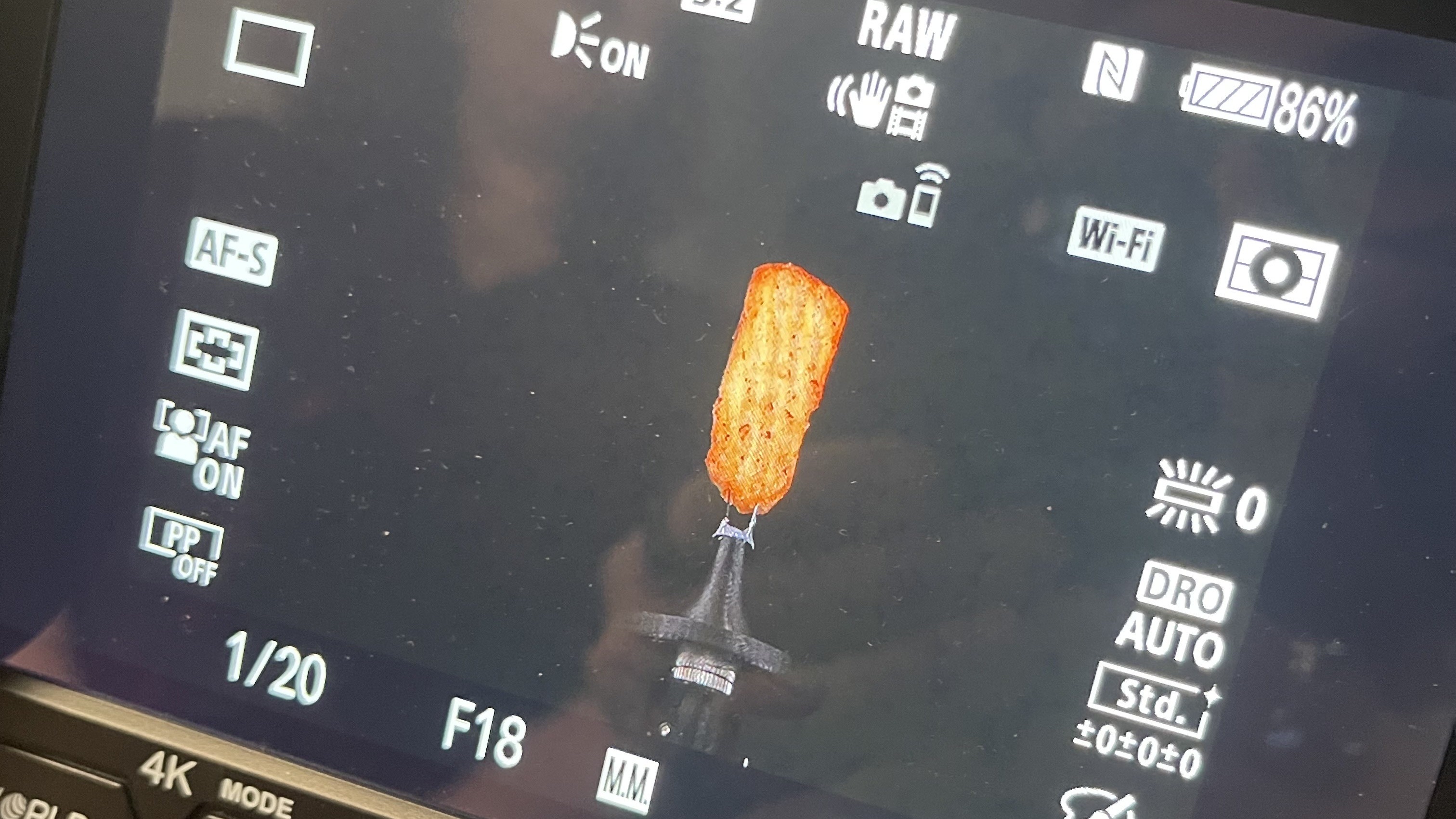 Foto van het inscannen van een frietje